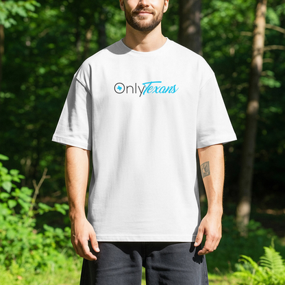 person standing outdoors wearing a white t-shirt with the text OnlyTexans across the chest.